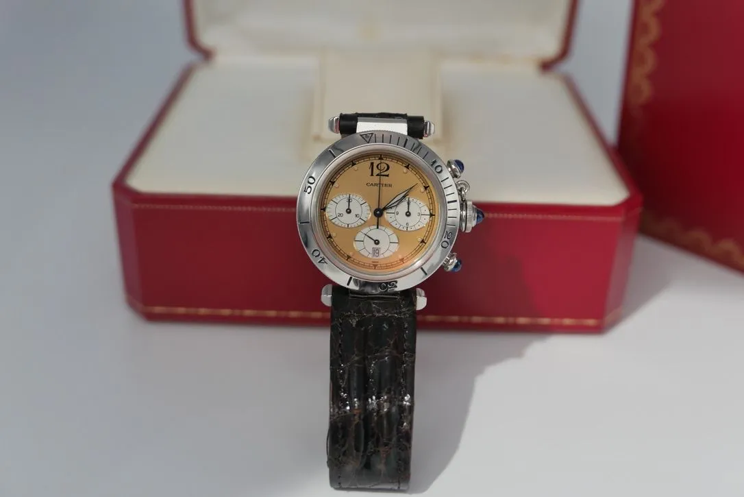 Cartier Pasha Plongeur chronograph with salmon dial standing before its presentation box