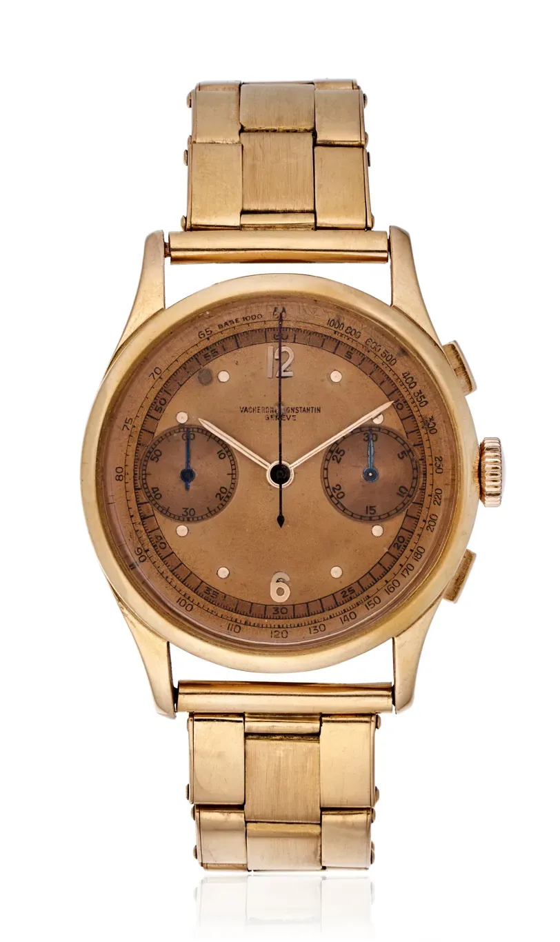 Vacheron Constantin Ref. 4072 pink gold chronograph, front-on view with teardrop lugs, brick-link bracelet, tropical patina dial and blue telemeter track
